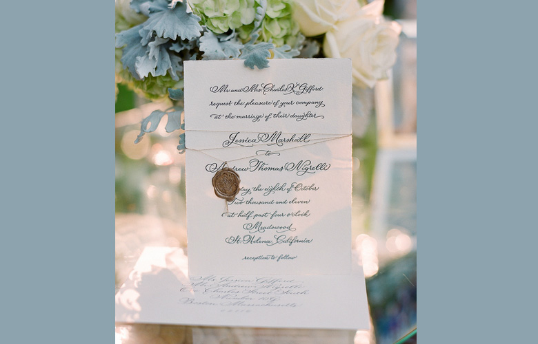 All of the pieces of this classic Flourished Copperplate suite were bound together with gold thread and a sealing wax stamp. Printed by Elizabeth Hubbell Studio. (Photo by Lisa Lefkowitz.)